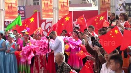 Hundreds of dancers take to the streets to celebrate China's National Day