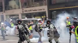 Chaos on streets of Hong Kong's Wan Chai as police storm protesters