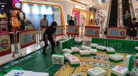 Shoppers play giant game of mahjong at Chinese mall