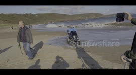 UK mobility scooter lady just missed a wave on surfers beach