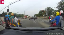 Motorcycle Takes Out Row Of Riders At Junction