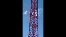 Man climbs crane near Shard