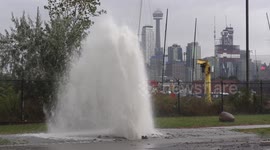 Storm sewers explode in downtown Toronto after heavy thunderstorms, rain and flooding hit the city as the extreme weather continues into autumn