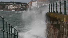 Waves crash against seawall in Cornwall as Hurricane Lorenzo reaches UK