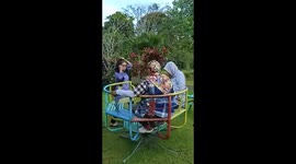 Elderly Women Break Playground Roundabout In Indonesia