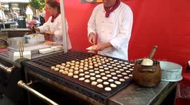 Dutch street food-Poffertjes-little pancakes in English