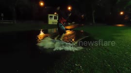 Skim Board Rider Falls into Huge Puddle in Flooded Field in Canada
