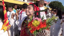 Devotees pierce their mouths with spikes at vegetarian festival in Thailand
