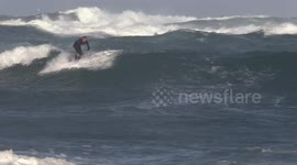 Surfers take to the sea as Storm Lorenzo brings rough waves to Cornwall