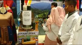 Students in West Sumatra show machine that processes plastic waste into fuel