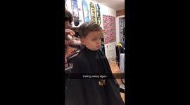 Child Snoozing during hair cut