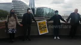 Chinese dissident artist Badiucao and author Ma Jian join Hong Kong pro-democracy demo in London