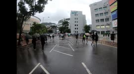 Protesters march to Kowloon Tong in march against face mask ban