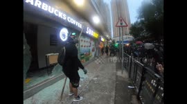 Hong Kong protesters smash windows of Starbucks in Kowloon