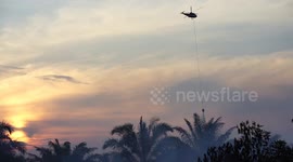 Emergency crews tackle forest and land fires in Riau province, Indonesia