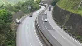 Out-of-control truck falls off 80-metre-high motorway in southwestern China