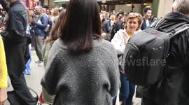 A Zombie Pranks The Onlookers watching The Zombies At World Zombie Day London