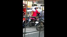 Dog In A Dress Rides Pillion On Motorcycle