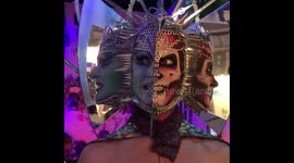 Two-faced Halloween makeup with mirror illusion will give you a fright