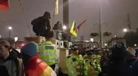 UK police surround hearse with locked-in driver at Extinction Rebellion protest
