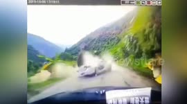 Huge boulder smashes car after tumbling down mountain in China