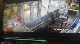 Woman in central India smashes up toll booth when asked to pay fee