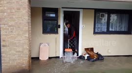 Finsbury Park residents attempt to rid their homes of floodwater