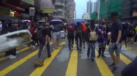 Protesters working to build barricade