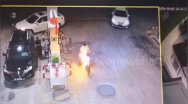 Gas station worker calmly puts out scooter that caught fire in China