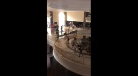 Employees attempt to clear floodwater at five-star hotel in Bodrum, Turkey
