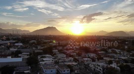 Sunset in Guadalupe Nuevo León overlooking the BBVA stadium in Rayados del Monterrey, the chair hill, and the city of Monterrey, sunset in June