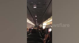 AirAsia passenger entertains flight with live guitar performance