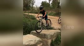 Talented 7-year-old does acrobatics with his bike