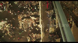 filming the relfection of the encants second hand market in barcelona from the mirrored roof