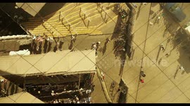 filming the relfection of the encants second hand market in barcelona from the mirrored roof
