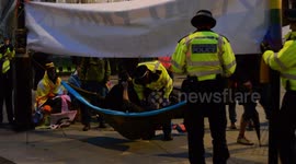 Police remove Extinction Rebellion campers outside Westminster Abbey