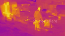 UK NEWS: Thermal Image video of Cadent Gas Engineers working at night in Wirksworth, Derbyshire on a cold night as the gas supply to 1500 homes was cut off a day ago by a burst water mains pipe.