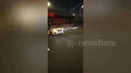 Horrifying scenes as bridge collapses onto busy Chinese highway