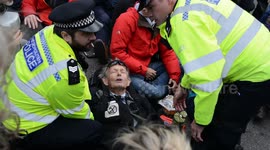 Extinction Rebellion protesters arrested as roof invader removed by police at London City Airport