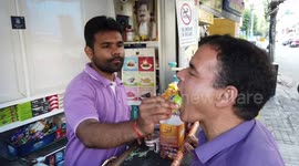 Shocking moment Indian man eats burning fire-paan and is completely unfazed