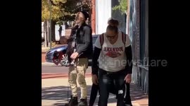 Disturbing scene as man, woman and BABY all appear to be under influence of drugs in Baltimore