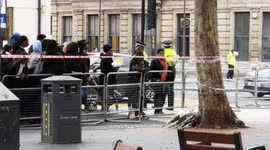 Grieving Family and Friends of the stratford stabbing victim lay flowers near his murder scene