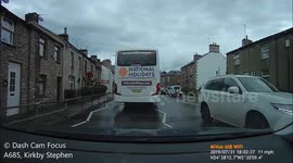 National Holidays Coach jumps a red traffic light in Kirkby Stephen
