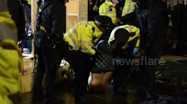 Heavy rain drenches Extinction Rebellion protesters in Trafalgar Square as more arrested