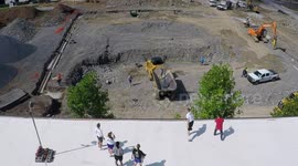 Incredible moment basketball coach lands 100ft trick shot from top of three-storey building in US