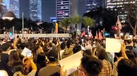 Hong Kong Protesters chant Fight for Freedom Stand with Hong Kong while bringing Central District traffic to a standstill
