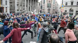 Extinction Rebellion protesters do yoga as second week of protests begin