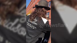 Jason Momoa enthusiastically greets workers at Harley-Davidson headquarters in Milwaukee