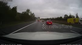 Shocking video shows ‘crazy’ motorist undertaking lorry at 100mph