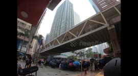 Protesters pushed back by riot police shooting rubber bullets and tear gas in Hong Kong's Wan Chai